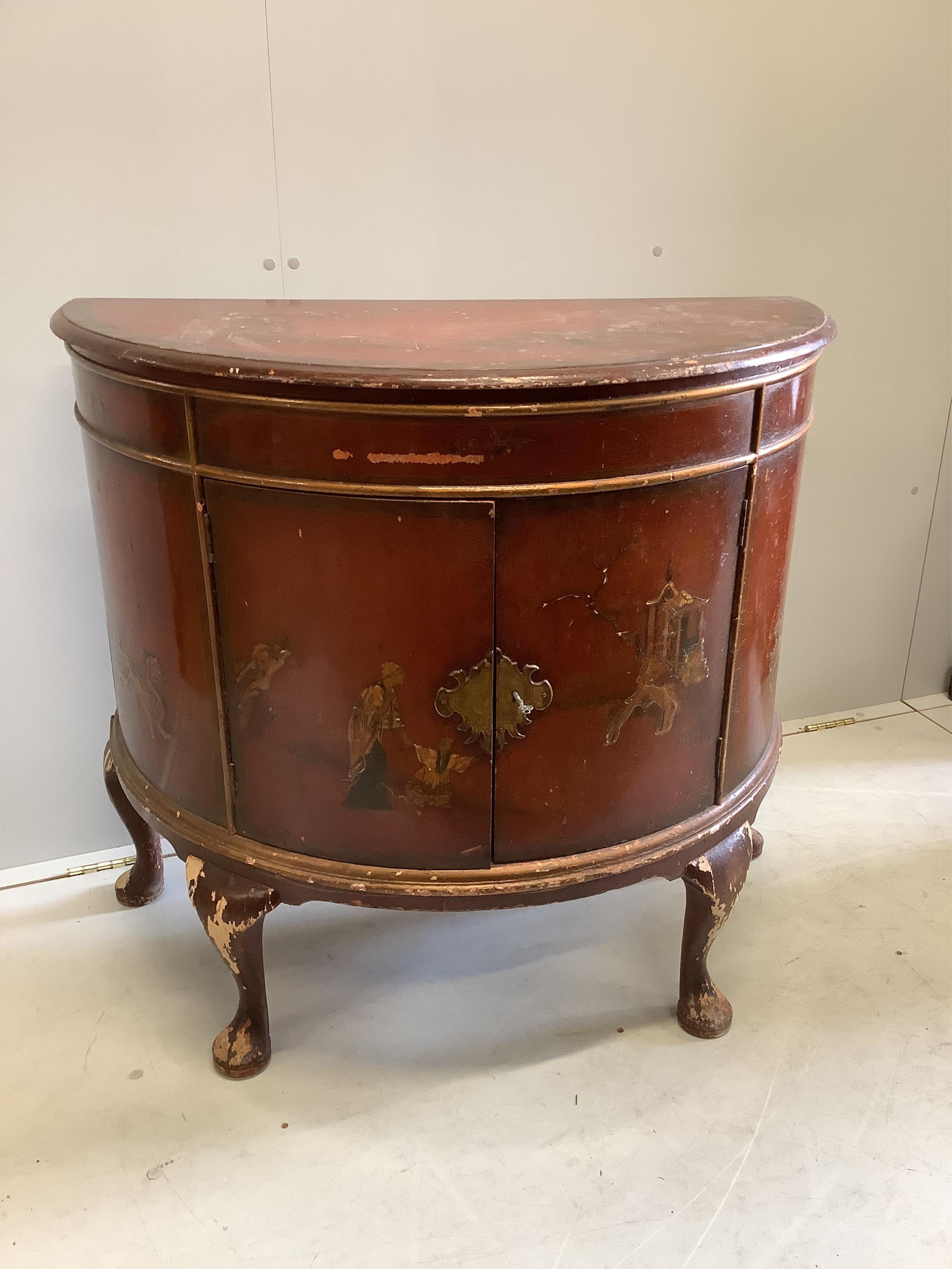 An early 20th century scarlet chinoiserie lacquer D shaped side cabinet, width 95cm, depth 49cm, height 86cm